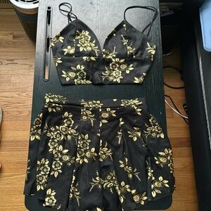 2 piece black and gold tie back top and flowy shorts